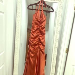 Burnt orange ruffled evening gown
